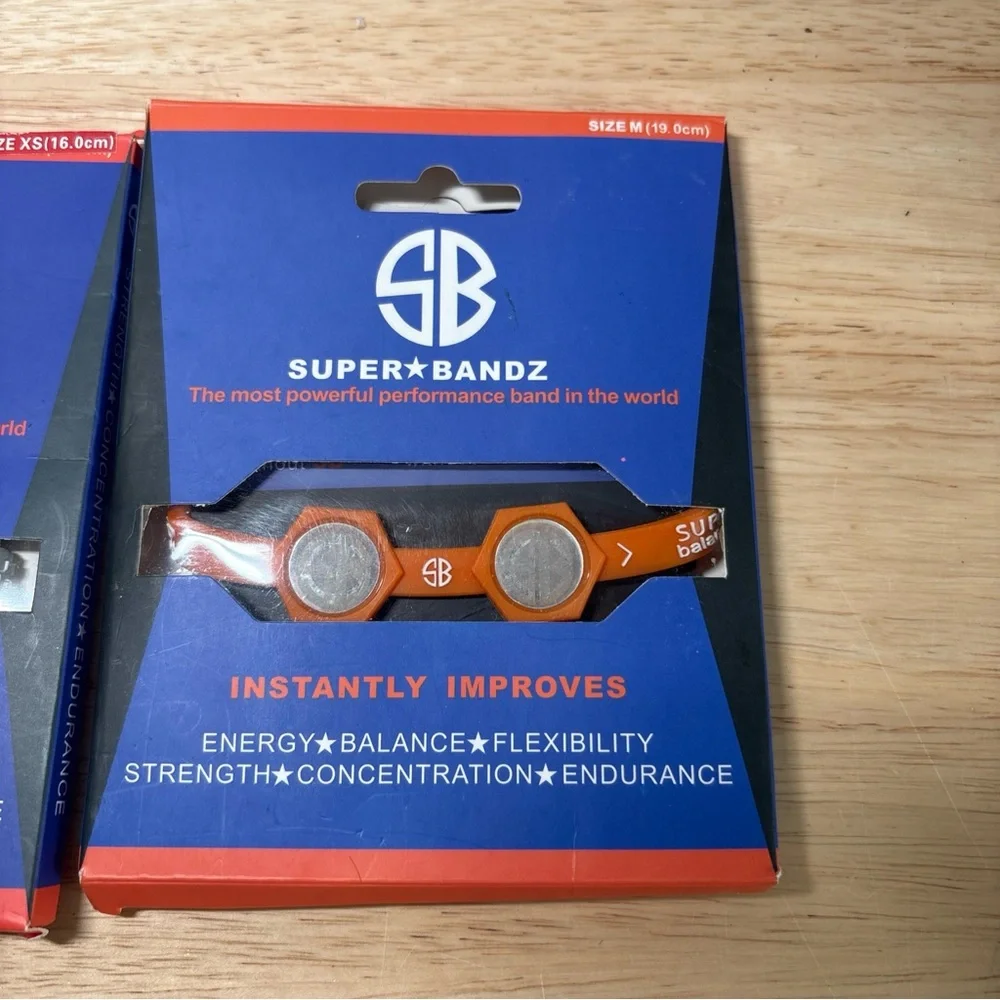 Lot Of 2 Super Bands Performance Wrist Bands